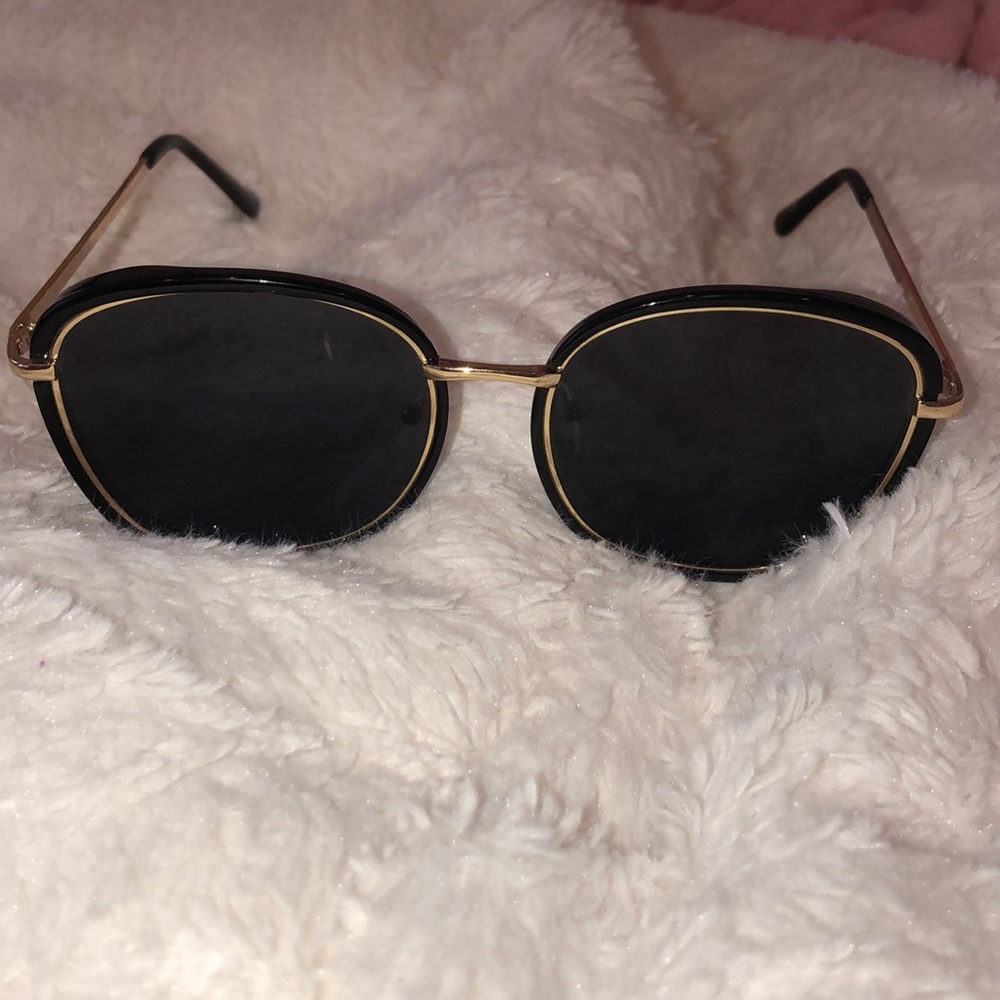 Black a gold sunglasses
